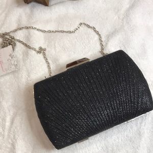 Brand new black clutch.
